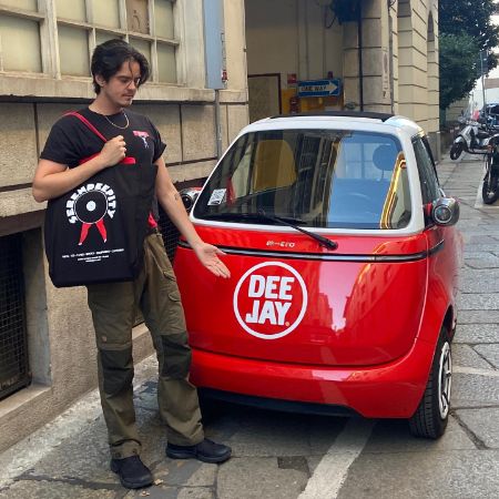 Miles Robbins took a picture next to a minicar in London. 